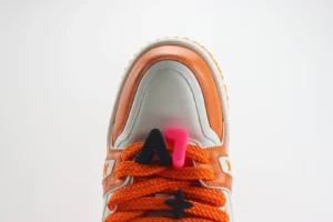 Nike Air Force 1 Low Travis Scott Sail Orange Peel bright mango leather sneakers with unique lace accessories