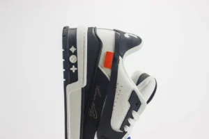 Louis Vuitton LV Trainer Sneaker 1A8V3Q white black leather with orange detail and monogram sole accents