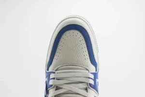 Nike Air Jordan 1 Mid white royal blue leather sneakers with perforated toe box and white laces