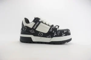 Louis Vuitton Trainer sneakers featuring a black and white design with iconic logo patterns, showcasing luxury footwear aesthetics and high-quality materials.