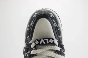 Louis Vuitton Trainer sneaker close-up, featuring distinctive logo, textured design, and premium materials, highlighting luxury replica footwear.
