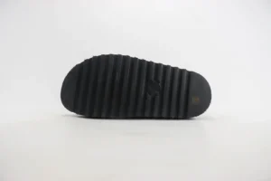 Chanel sneakers black rubber sole with ridged pattern and Chanel logo embossed rubber outsole