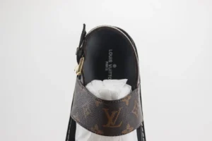 Louis Vuitton sandal brown monogram leather with gold buckle and black footbed