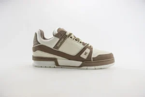 Tyler x Louis Vuitton Trainer sneaker in beige and brown, showcasing premium materials and craftsmanship, available for purchase on e-commerce site.