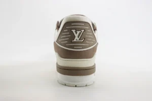 Tyler x Louis Vuitton Trainer sneaker featuring the iconic LV logo on the heel, showcasing luxury design and craftsmanship.