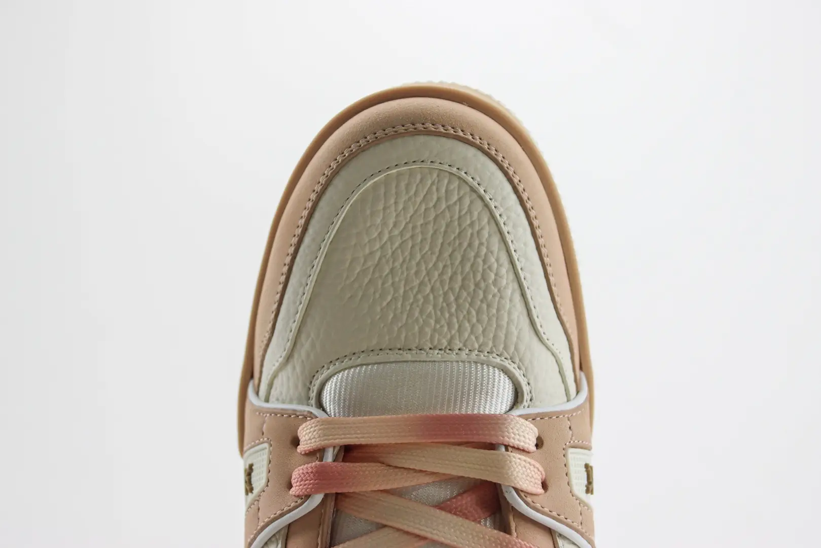 New Balance 550 beige blush pink leather sneakers with gradient laces and textured upper material