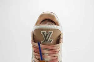 Louis Vuitton LV Trainer sneaker beige white leather and mesh upper with LV logo on tongue