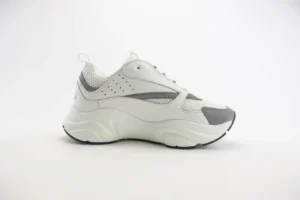 Brand unknown white and gray low-top sneaker with mesh and leather upper and thick rubber sole
