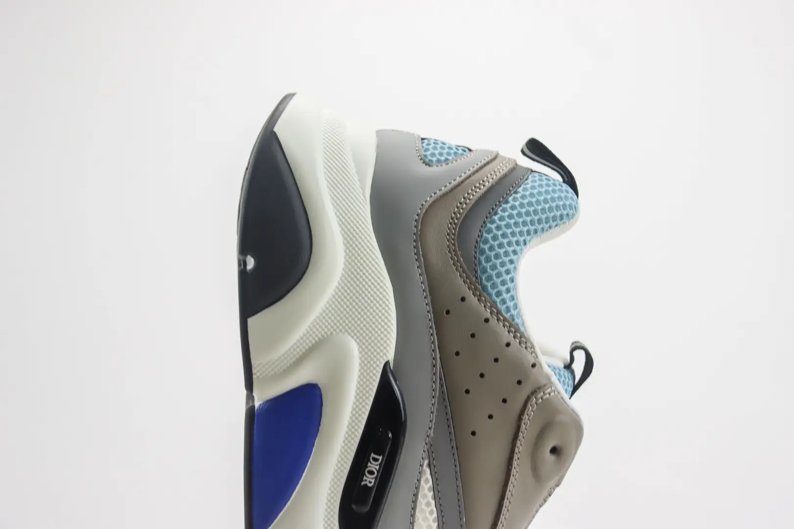 Dior B22 sneaker style 553013 blue grey colorway mixed mesh and leather material