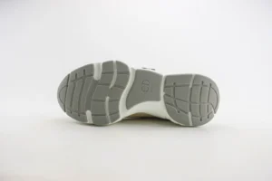 Dior B22 shoes sole featuring engraved logo and textured rubber design, emphasizing luxury sneaker craftsmanship.