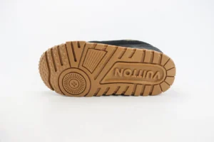 Louis Vuitton Trainer sneaker sole featuring logo and textured rubber design, showcasing luxury craftsmanship and quality.