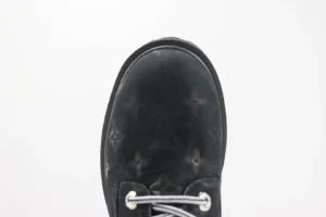 Louis Vuitton LV Trainer Black Monogram suede sneakers with rubber sole and silver eyelets