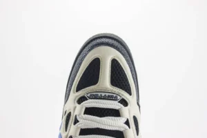 Dior B22 sneaker white black blue mesh leather upper with rope laces close-up view