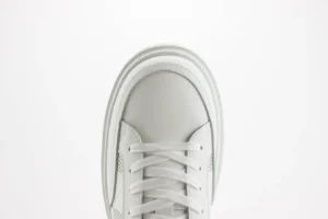 Adidas Yeezy QNTM Quantum white and green leather sneakers with lace-up design and padded collar