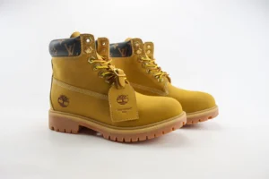 Louis Vuitton Timberland boots mustard yellow leather with monogram canvas collar and rubber sole