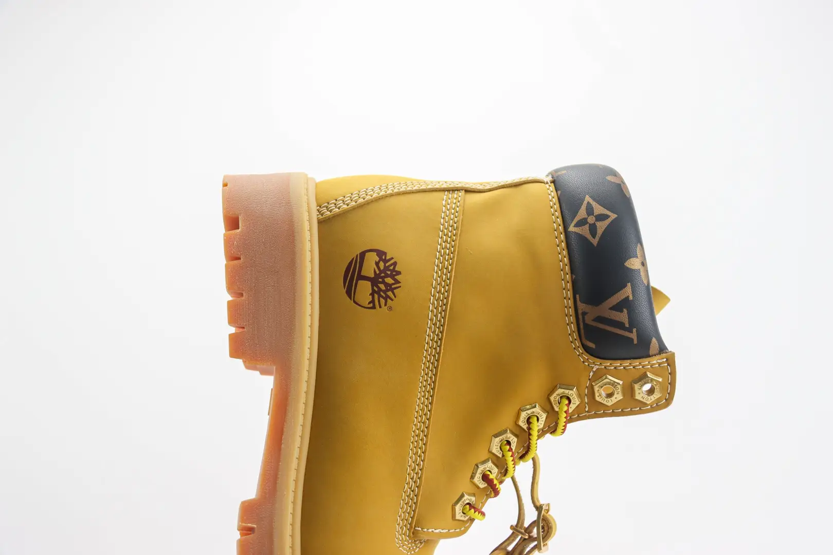 Timberland boots yellow leather with brown leather monogram collar and lug rubber sole sneakers