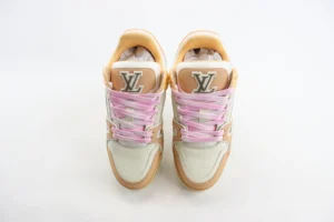 Louis Vuitton Trainer Low Cut Casual sneakers with pink laces and logo, showcasing luxury design and craftsmanship.