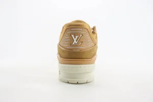 Louis Vuitton Trainer low-cut casual sneaker, rear view showcasing logo and design details, emphasizing luxury craftsmanship and style.