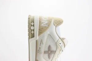 Louis Vuitton LV Trainer sneaker beige monogram canvas leather luxury sneaker with white mesh panel