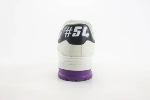 Louis Vuitton Trainer low-cut casual sneaker featuring a white upper, purple sole, and black heel with "#54" graphic, emphasizing luxury design and style.
