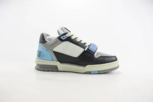 Louis Vuitton Trainer Limited Edition sneakers in black, blue, and grey, showcasing a stylish low-cut design and premium materials, ideal for luxury footwear enthusiasts.