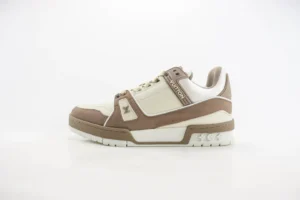 Louis Vuitton Trainer Low Cut Casual sneaker in beige and white, featuring a unique design and luxury craftsmanship, showcased against a plain background.