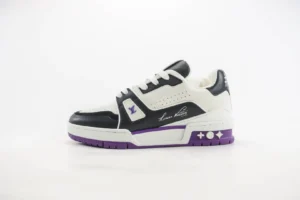Louis Vuitton Trainer Low Cut Casual sneaker in black and white with purple accents, showcasing luxury design and craftsmanship.