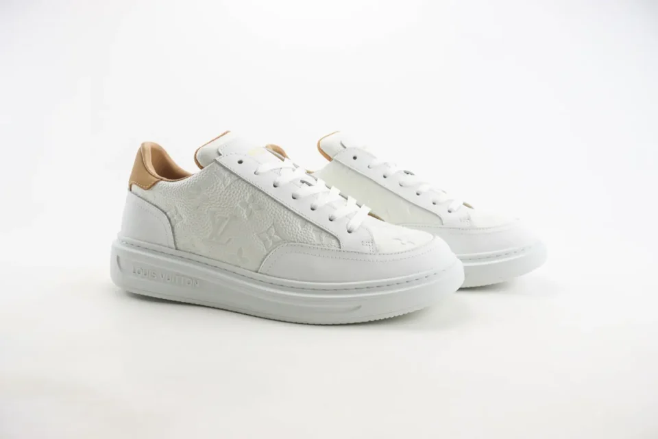Louis Vuitton LV Trainer sneaker white beige monogram embossed leather sneakers