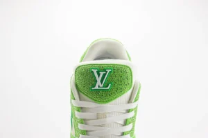 Crystal Diamond Shoes Louis Vuitton Trainer featuring green accents and iconic LV logo, highlighting luxury sneaker design.