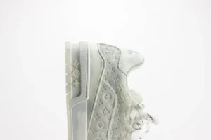 Louis Vuitton LV Trainer sneaker white monogram embossed leather luxury sneaker