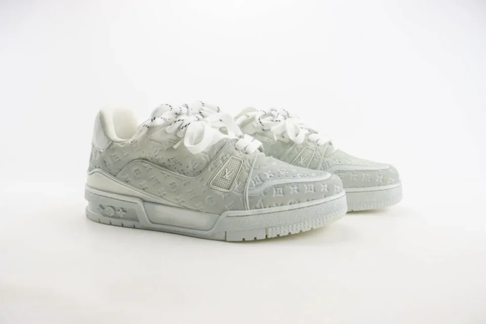 Louis Vuitton LV Trainer white monogram embossed leather sneakers with white laces and rubber sole