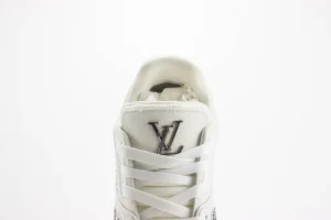 Louis Vuitton Trainer limited edition low-cut casual board shoe featuring prominent LV logo and white laces, showcasing luxury footwear design.
