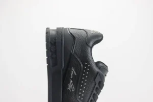 Louis Vuitton LV Trainer sneaker black leather studded detailing luxury athletic shoe