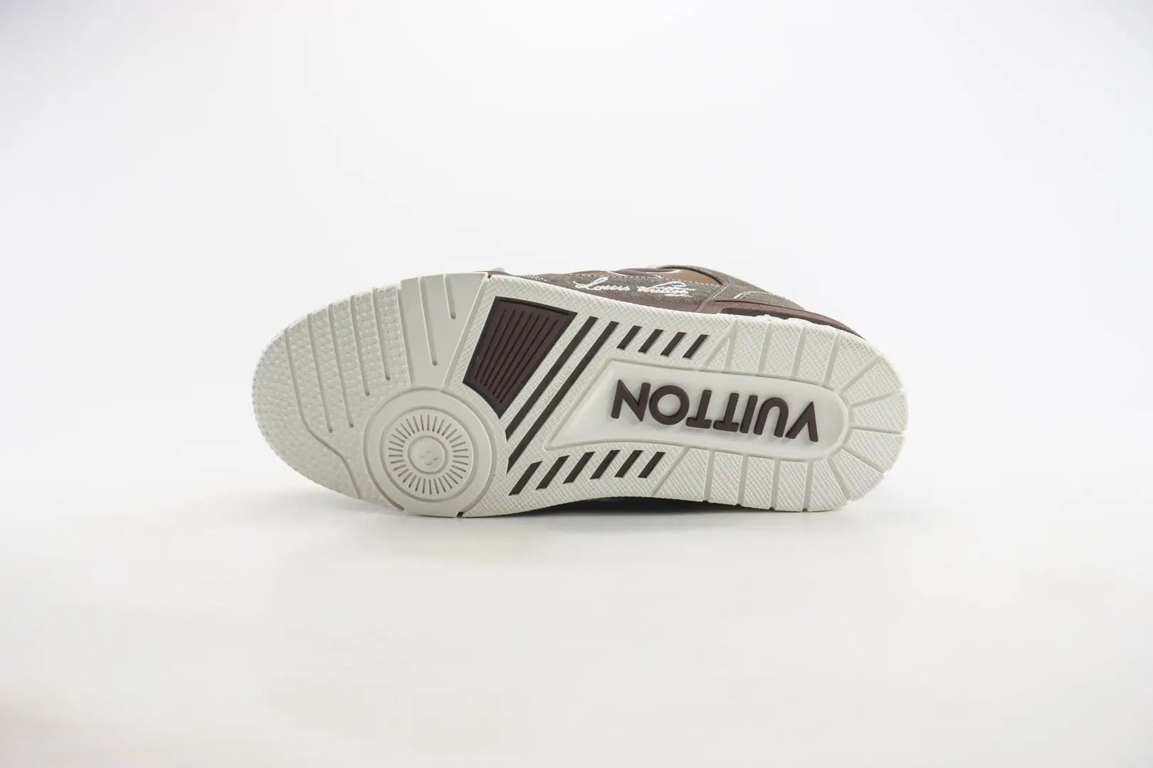 Louis Vuitton Trainer limited edition low-cut casual board shoes sole, featuring logo and tread design, on a neutral background.