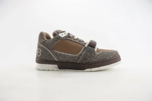 Louis Vuitton Trainer limited edition low-cut casual board shoes in brown and gray, featuring a textured design and white sole, displayed on a neutral background.