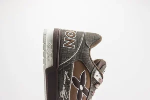 Louis Vuitton Trainer limited edition low-cut casual board shoe featuring a brown and gray design with floral accents and logo detailing.