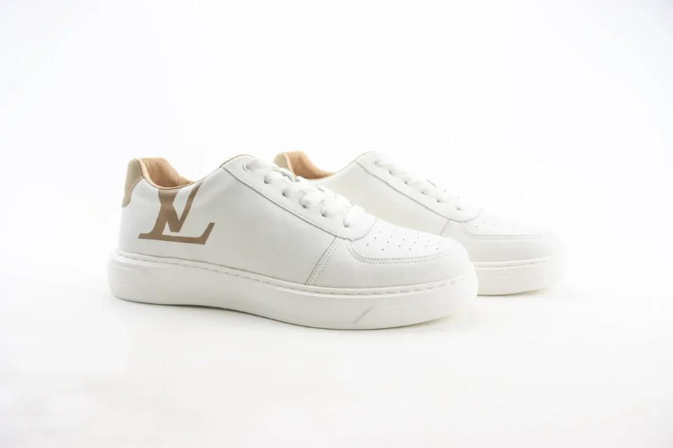 Louis Vuitton Luxembourg white beige leather sneakers with LV logo on side and perforated toe box