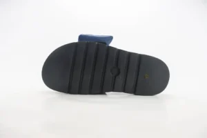 Leather round toe flip flops from Takashi Murakami x Louis Vuitton collection, featuring a black sole with ridges and a blue strap, suitable for luxury footwear enthusiasts.