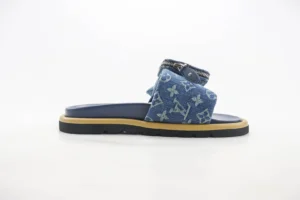 Leather round toe flip flops from Takashi Murakami x Louis Vuitton collection, featuring a blue denim upper with iconic logo pattern and lightweight sole, ideal for indoor and outdoor wear.
