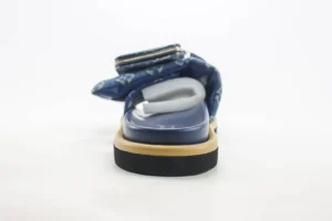 Leather round toe flip flops from Takashi Murakami x Louis Vuitton collection, featuring a blue patterned upper and a thick sole, ideal for both indoor and outdoor wear.