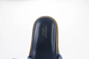 Leather round toe flip flops by Louis Vuitton featuring a blue upper and gold accents, showcasing the brand logo for Takashi Murakami x Louis Vuitton collection, ideal for luxury footwear enthusiasts.
