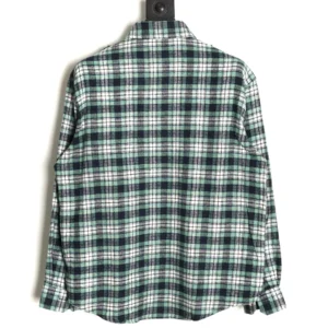 Celine green plaid flannel long-sleeved shirt featuring a checked pattern and two flap pockets, displayed from the back.