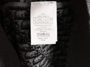 Fendi garment tag 054G12AM055 black material label 97% cashmere 2% nylon 1% polyurethane made in Italy