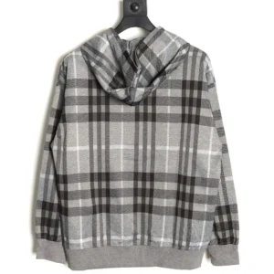 No brand or model visible gray and black plaid patterned hoodie sweatshirt with long sleeves and hood