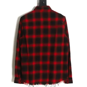 No brand or product details visible on red and black checkered flannel shirt with frayed hem