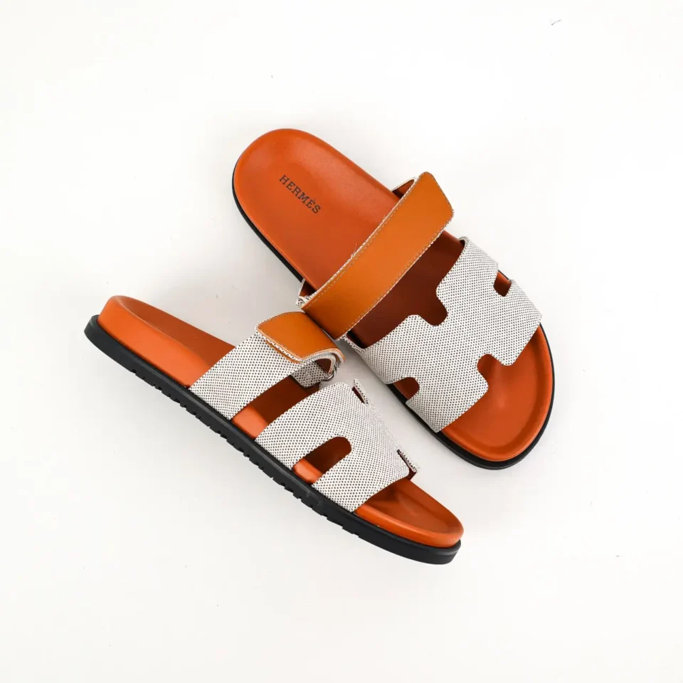 Hermes Oran sandals orange white leather slides with black rubber sole summer footwear