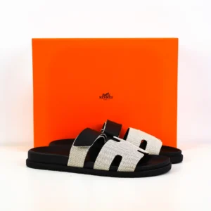 Hermes Oran sandals black ivory canvas leather slide sandals with signature H cutout detail