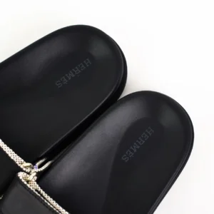 Hermes slides black leather casual sandals with beige zipper detail and embossed logo footbed