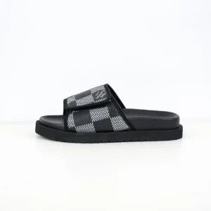 Lv Miami Damier Round Head One Word Slippers in black and grey woven pattern, featuring a sleek slide design and luxury branding, ideal for casual wear.
