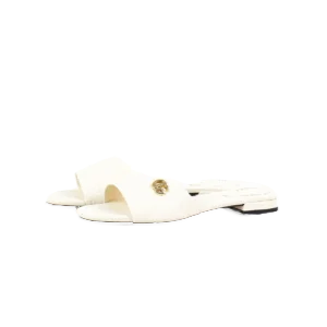 Gucci Double G women's slippers in white sheepskin leather, showcasing designer style and comfort, available for purchase on RepsGoat.